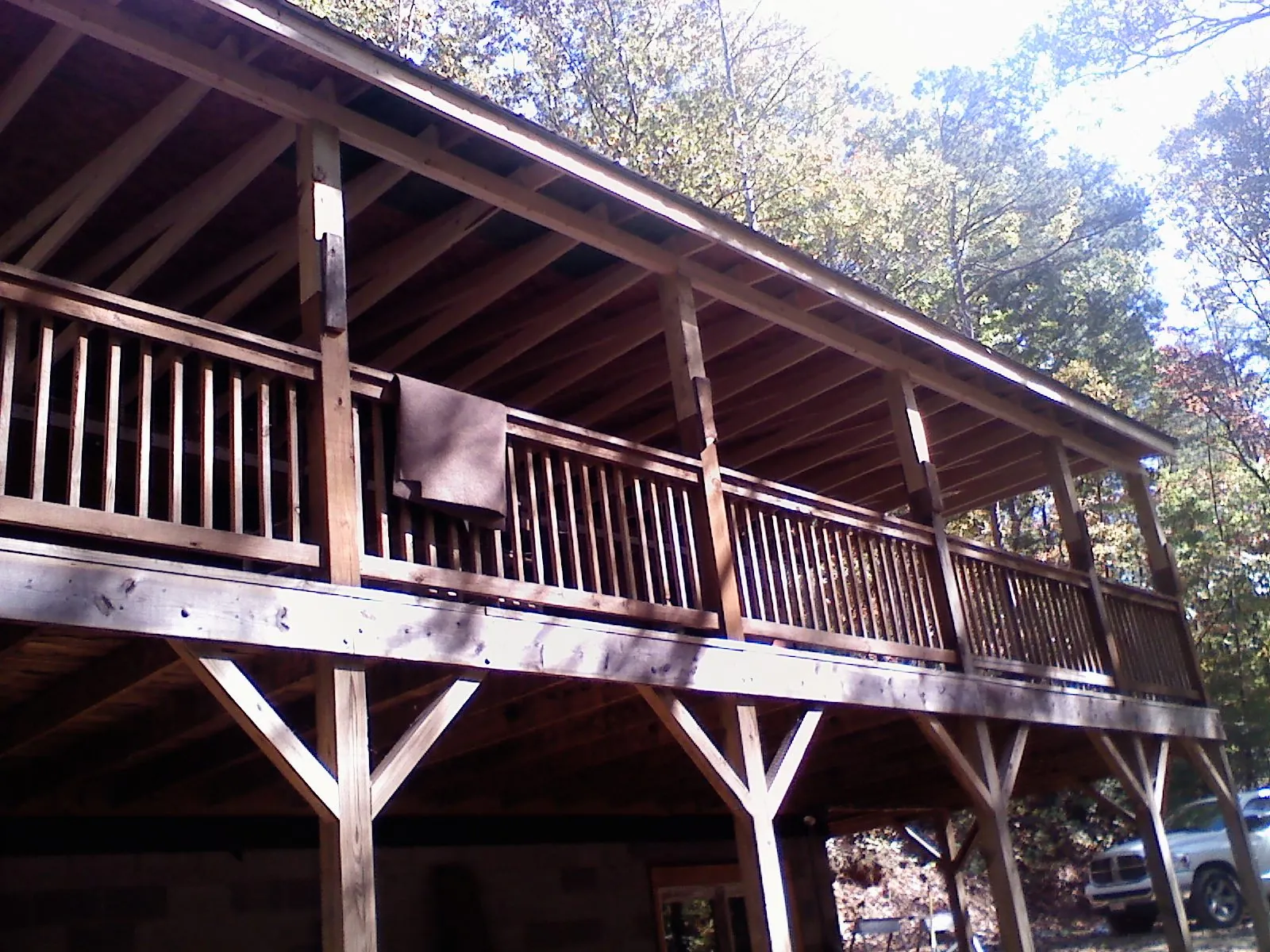 Timber framing under a new elevated porch and deck — Roof Leak Repair in Herrick by Roofing Brothers
